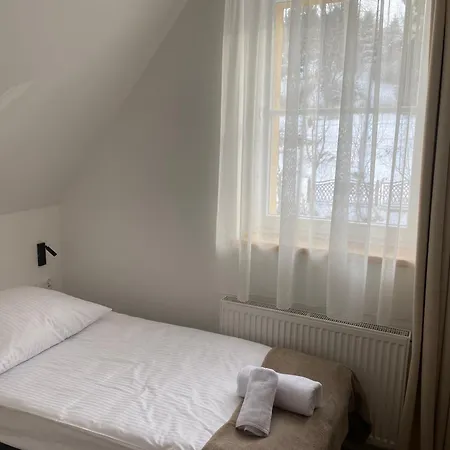 Aparthotel Modrzew - W Pyzowce *